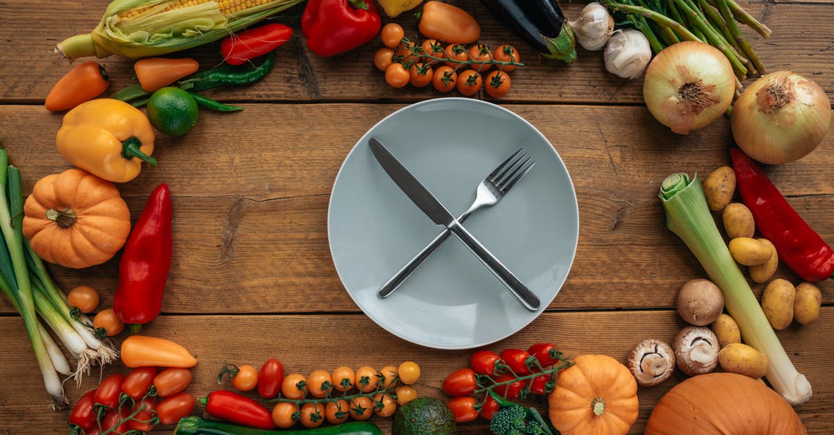 Corn Starch vs Potato Starch - Knife and Fork on a Ceramic Plate Surrounded by Assorted Vegetables Corn Starch vs Potato Starch - Knife and Fork on a Ceramic Plate Surrounded by Assorted Vegetables