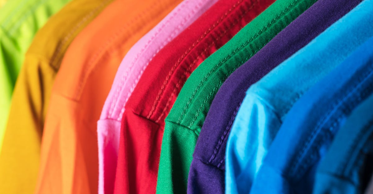 Cornmeal won’t set up - Closeup of multicolored vibrant cotton t shirts hanging in row in modern wardrobe Cornmeal won’t set up - Closeup of multicolored vibrant cotton t shirts hanging in row in modern wardrobe