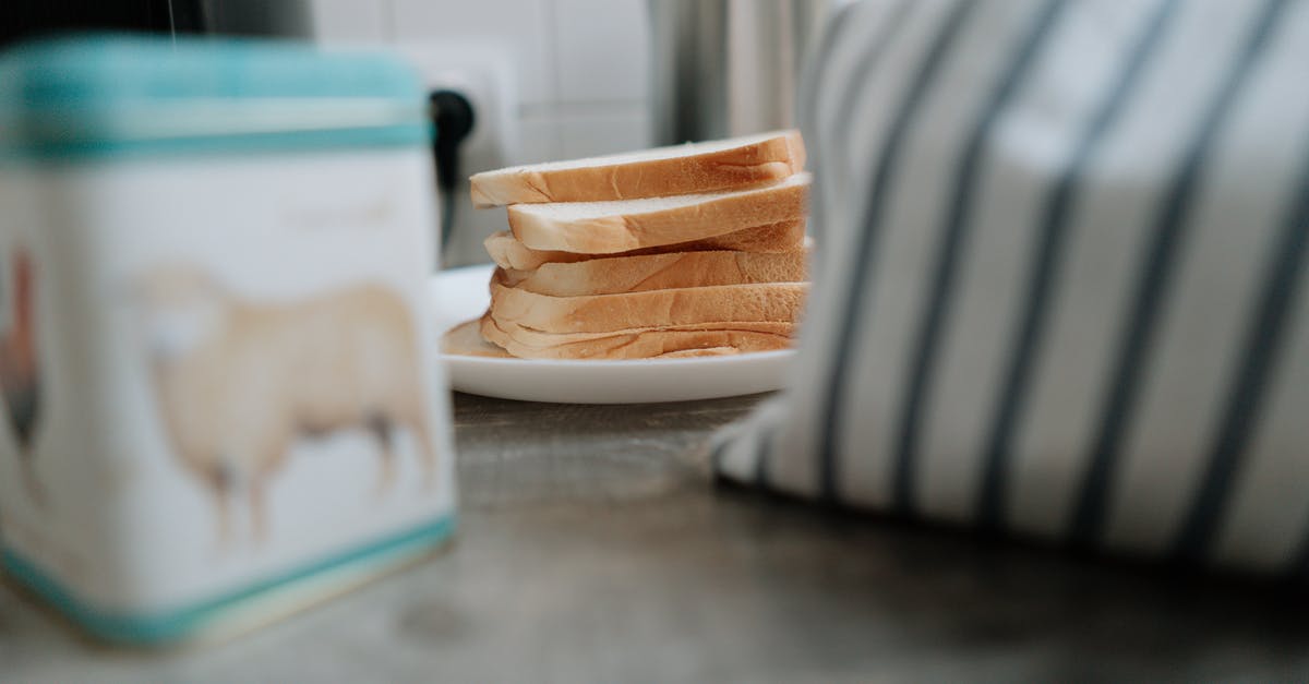 Could you use a bread tin as a pate mould? - A Pile of Sliced Bread on a White Plate