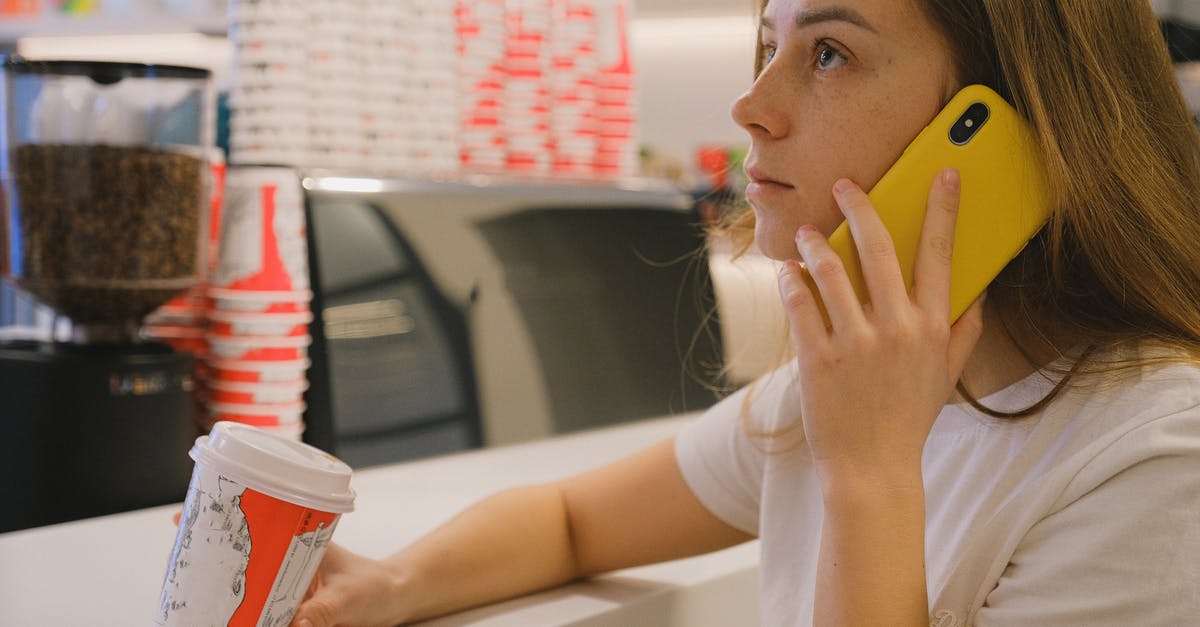 Counter to bitterness in soup - Woman in White Shirt Holding Yellow Cellphone Counter to bitterness in soup - Woman in White Shirt Holding Yellow Cellphone