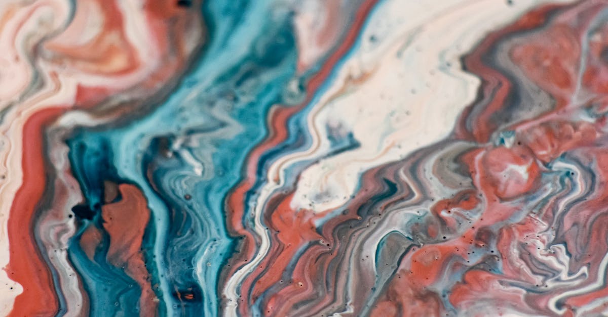 Creating differing temperature fluid gels that stay separate - Creative abstract background with vivid multicolored paints mixed together in technique of fluid art Creating differing temperature fluid gels that stay separate - Creative abstract background with vivid multicolored paints mixed together in technique of fluid art