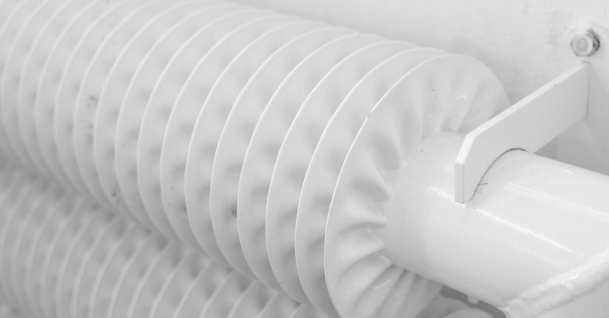 Cresomo 101oz Stainless Steel Vacuum Airpot plunger stuck after cleaning? - White metal tubed radiator system with pipe for industrial heating mounted to wall with hook in light room at home Cresomo 101oz Stainless Steel Vacuum Airpot plunger stuck after cleaning? - White metal tubed radiator system with pipe for industrial heating mounted to wall with hook in light room at home