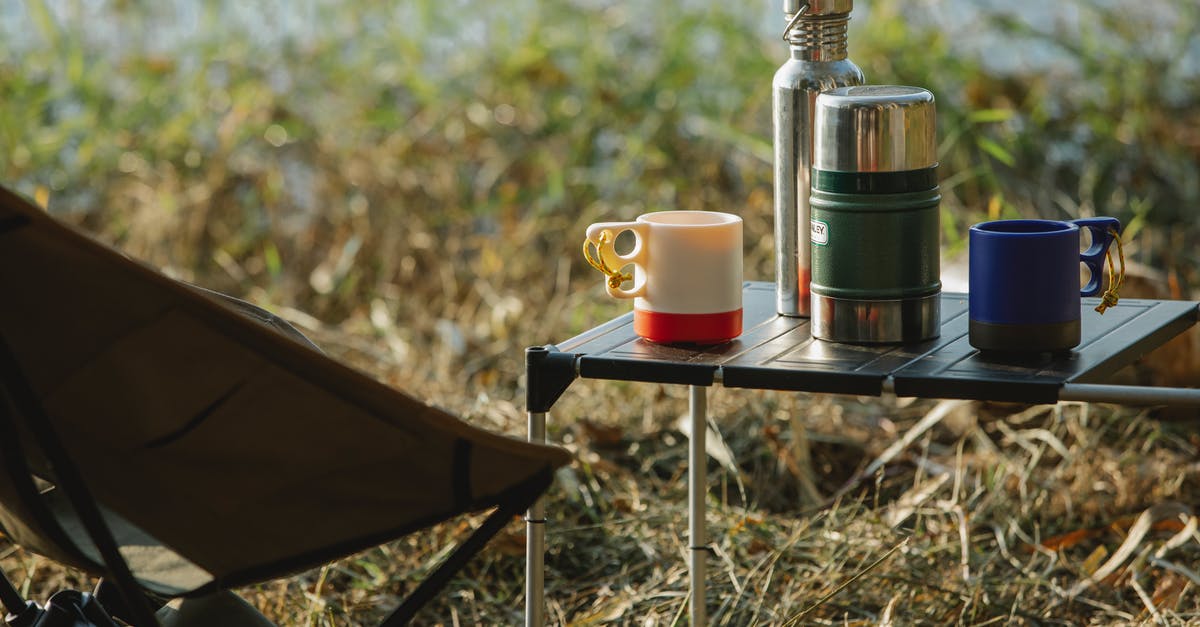 Cresomo 101oz Stainless Steel Vacuum Airpot plunger stuck after cleaning? - Stainless steel vacuum flasks and mugs with hot drinks on portable table near folding chair on grass shore Cresomo 101oz Stainless Steel Vacuum Airpot plunger stuck after cleaning? - Stainless steel vacuum flasks and mugs with hot drinks on portable table near folding chair on grass shore