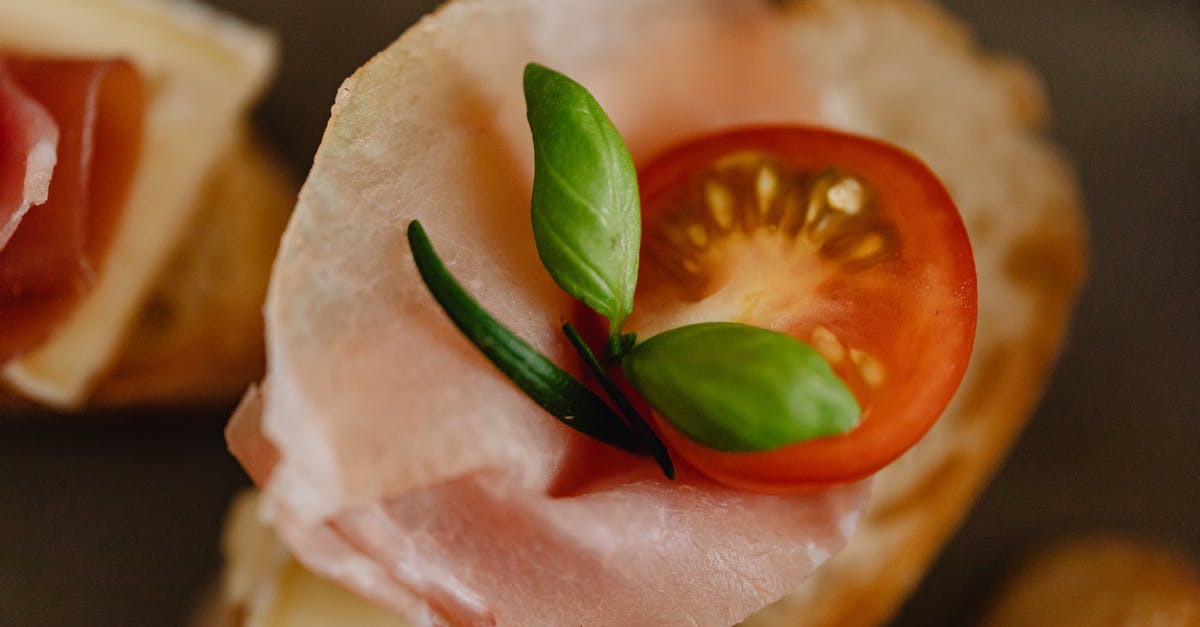 Crisping prosciutto - Close-up Shot of Prosciutto Ham on Bread Crisping prosciutto - Close-up Shot of Prosciutto Ham on Bread