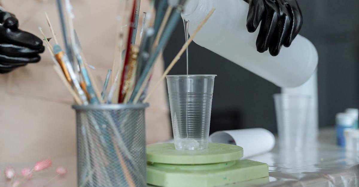Cups v. weighing scales - is there an historical explanation? - A Person Wearing Rubber Gloves Pouring Resin on Plastic Cup Cups v. weighing scales - is there an historical explanation? - A Person Wearing Rubber Gloves Pouring Resin on Plastic Cup
