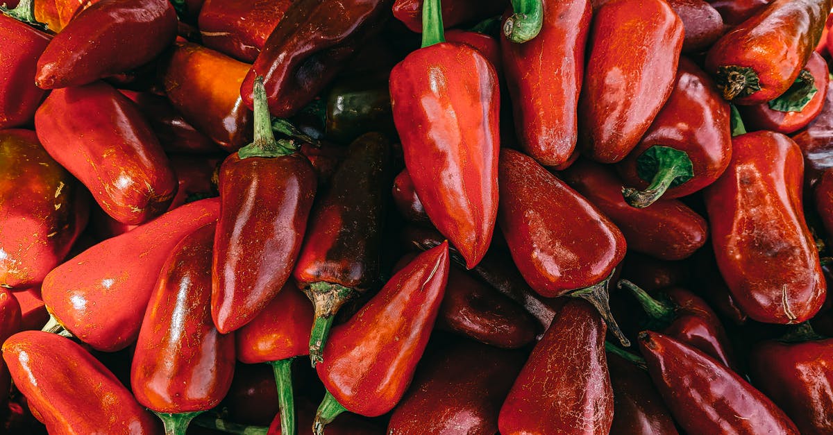 Cure for burns from hot peppers / capsicum oil? - Red Bell Pepper Lot in Close Up Photography Cure for burns from hot peppers / capsicum oil? - Red Bell Pepper Lot in Close Up Photography