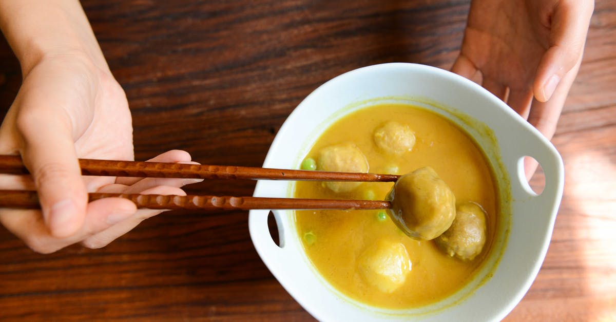 Curried parsnip soup, not flavoursome enough - Person Holding Chopsticks and White Ceramic Bowl Curried parsnip soup, not flavoursome enough - Person Holding Chopsticks and White Ceramic Bowl