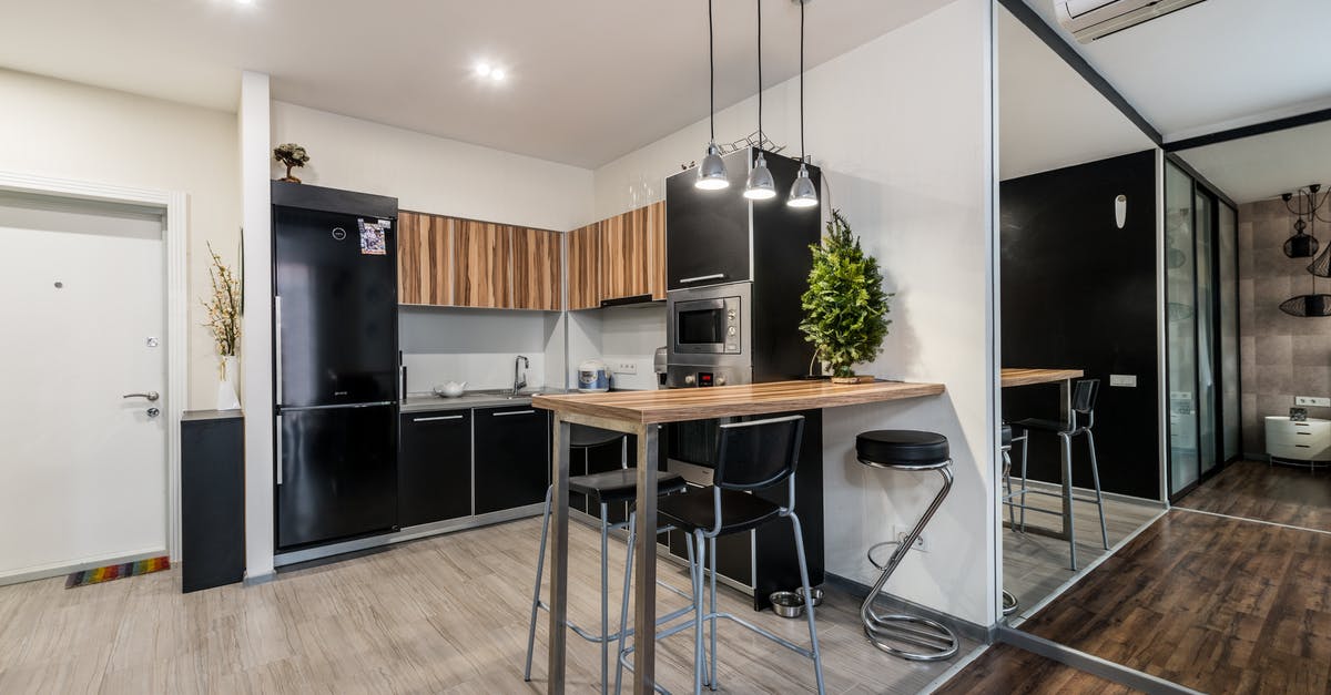 damaged microwave door - Modern kitchen in apartment with table damaged microwave door - Modern kitchen in apartment with table