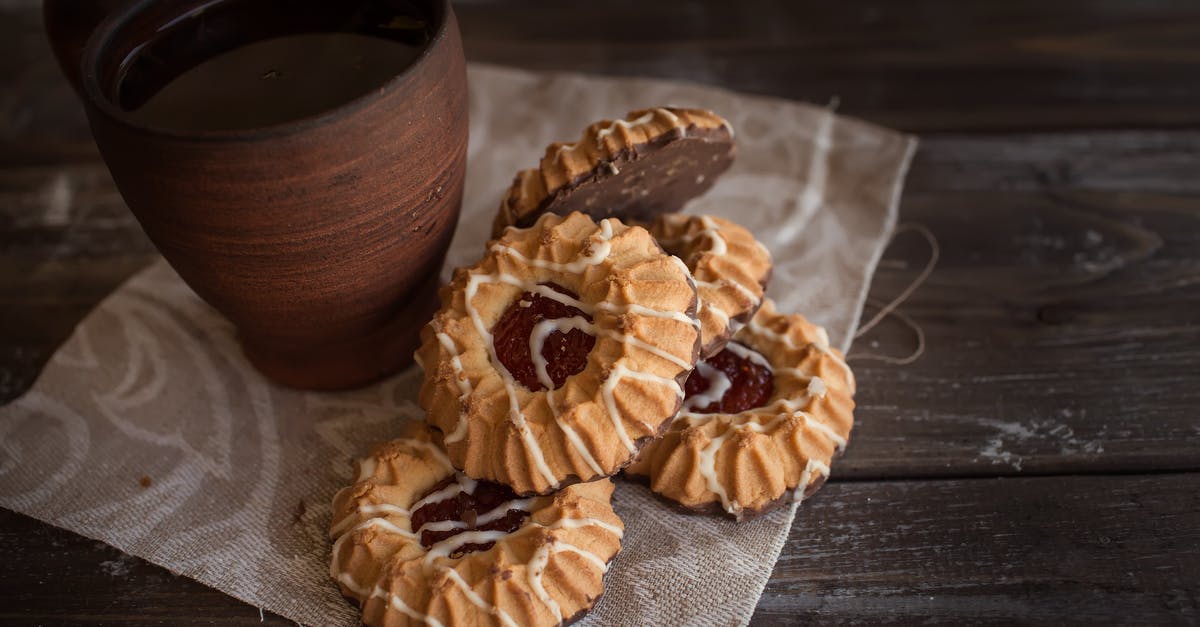 dark black furrows in sweet potatoes - Brown Mug Beside Cookies dark black furrows in sweet potatoes - Brown Mug Beside Cookies
