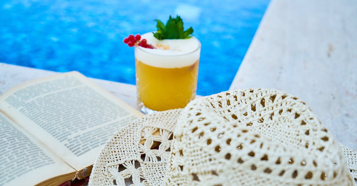 Day 8 of Sourdough Starter, is it still alive? - Clear Drinking Glass With Juice On A Poolside Day 8 of Sourdough Starter, is it still alive? - Clear Drinking Glass With Juice On A Poolside