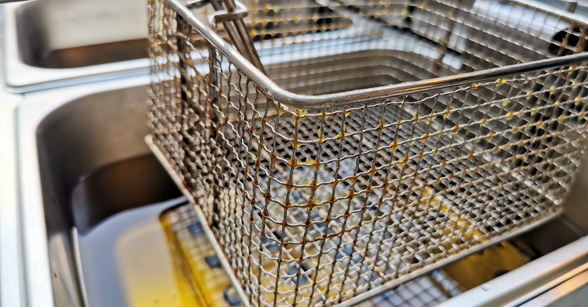 Deep fryer oil guidelines - Stainless Steel Shopping Cart on Yellow Sink Deep fryer oil guidelines - Stainless Steel Shopping Cart on Yellow Sink