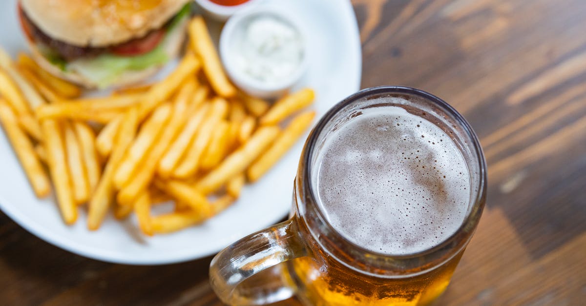 Deep frying - beer batter vs. bread crumbs - Clear Glass Mug With Brown Liquid Deep frying - beer batter vs. bread crumbs - Clear Glass Mug With Brown Liquid
