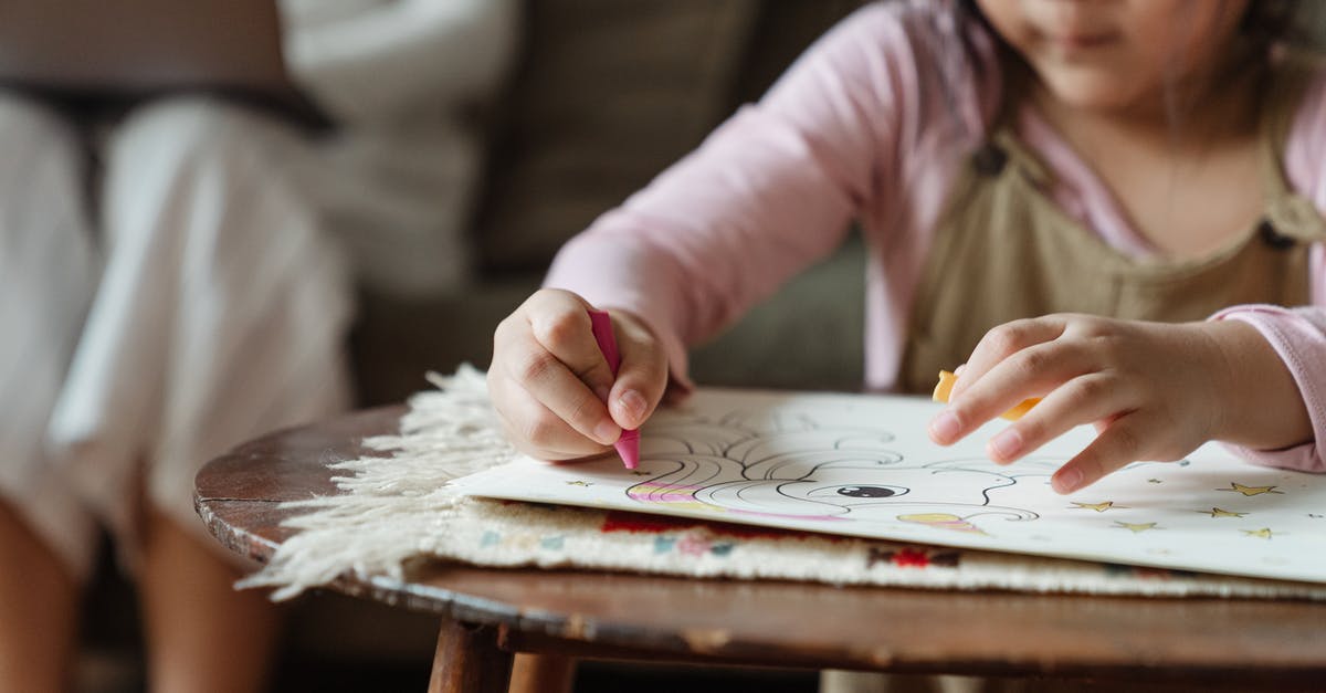 Dehydrating Strawberries - Wax Paper or Parchment? - Crop girl coloring drawing with wax pencils at coffee table Dehydrating Strawberries - Wax Paper or Parchment? - Crop girl coloring drawing with wax pencils at coffee table