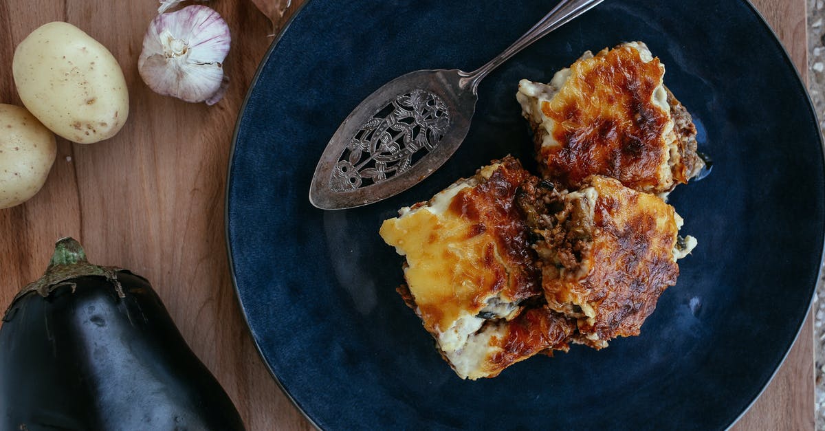 De-meatifying lasagna, casseroles - Stainless Steel Spoon on Blue Ceramic Plate with Vegetarian Eggplant Lasagna De-meatifying lasagna, casseroles - Stainless Steel Spoon on Blue Ceramic Plate with Vegetarian Eggplant Lasagna