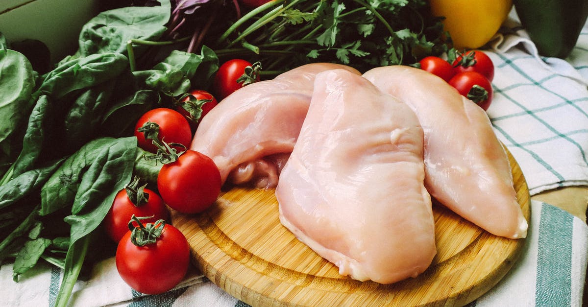 Desperately Seeking Chicken Haddies - Red Tomato and Green Leaves on Brown Wooden Chopping Board Desperately Seeking Chicken Haddies - Red Tomato and Green Leaves on Brown Wooden Chopping Board