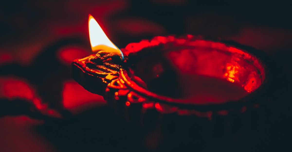 Did I just almost start an oil fire? - Diya burning on table in darkness Did I just almost start an oil fire? - Diya burning on table in darkness