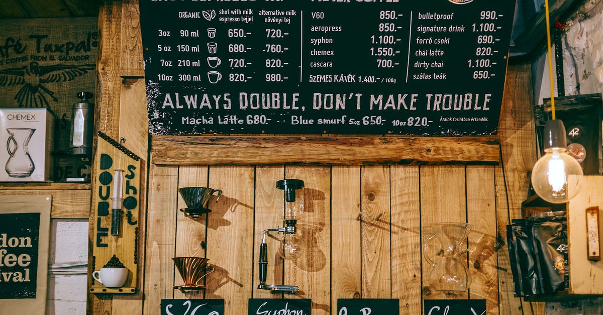 Difference in caffeine levels between light and bold coffee? - Cozy coffee house with creative decorated menu board Difference in caffeine levels between light and bold coffee? - Cozy coffee house with creative decorated menu board