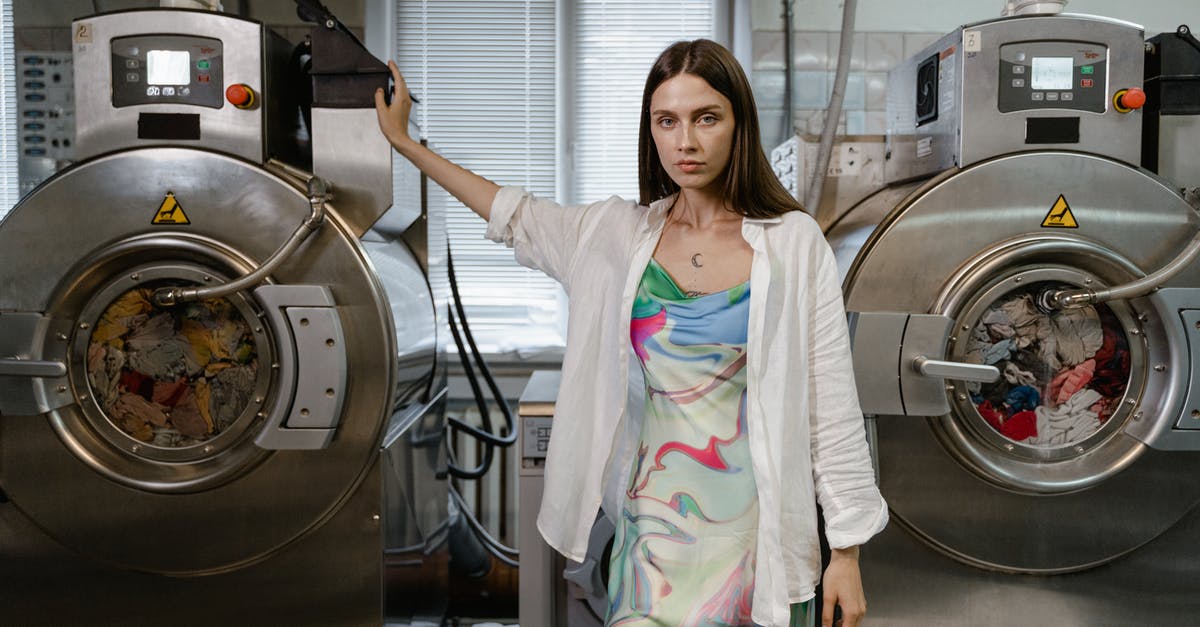 Differences between cloth, fiberglass and silicone baking mats? - Woman Standing Between Washing Machine Differences between cloth, fiberglass and silicone baking mats? - Woman Standing Between Washing Machine