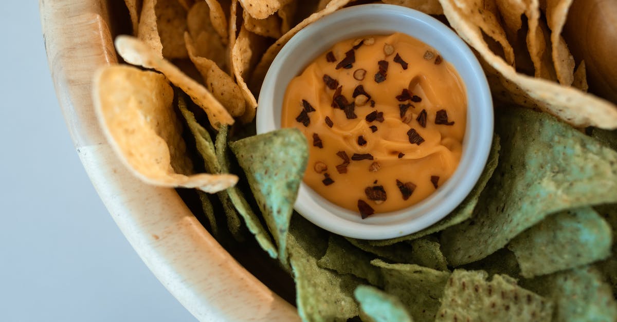 Dipping sauce for shabu-shabu - Chips and Dipping Sauce in a Bowl Dipping sauce for shabu-shabu - Chips and Dipping Sauce in a Bowl