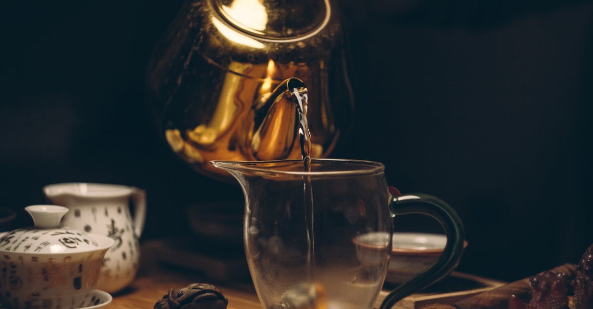 Discoloration in tea kettle - Gold Steel Kettle Beside Clear Glass Pitcher Discoloration in tea kettle - Gold Steel Kettle Beside Clear Glass Pitcher
