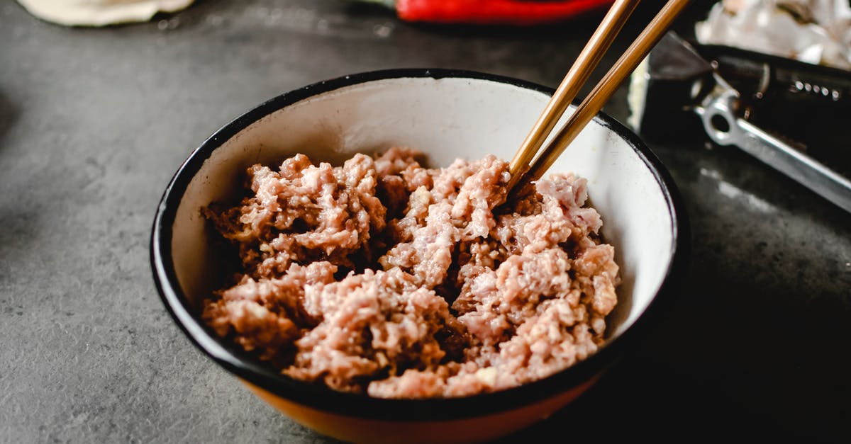 Discolored Ground Meat [closed] - Uncooked Ground Pork on Ceramic Bowl