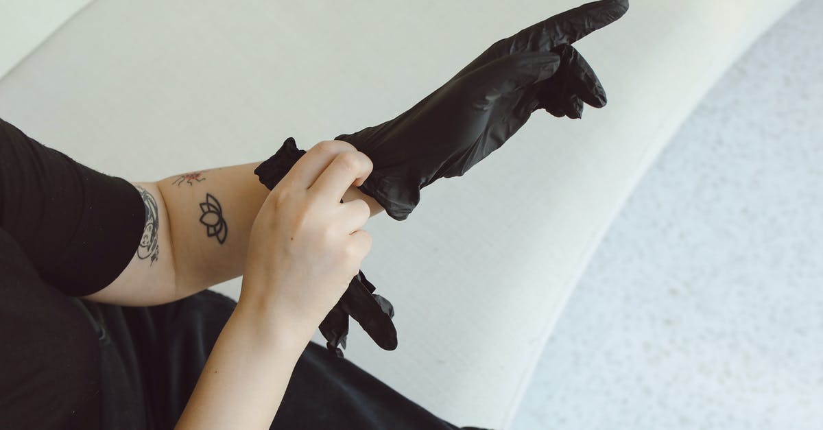 Disposable cookware - Person in Black Long Sleeve Shirt Holding Black Umbrella Disposable cookware - Person in Black Long Sleeve Shirt Holding Black Umbrella