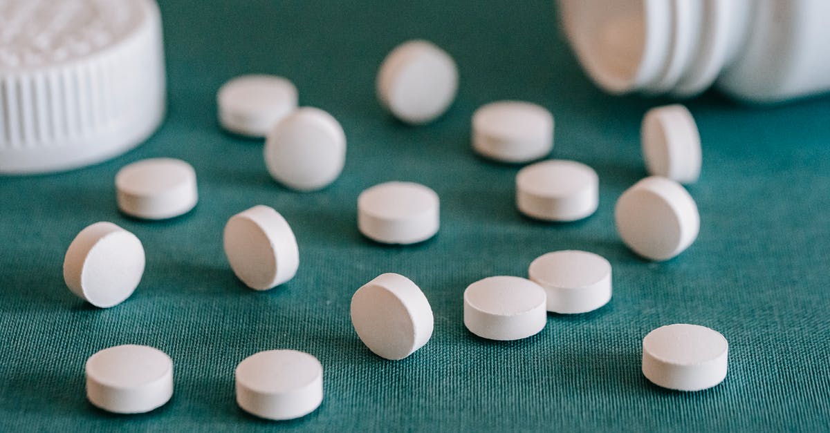 Distinguishing the size of tablecloths when folded? [closed] - White pills spilled on table