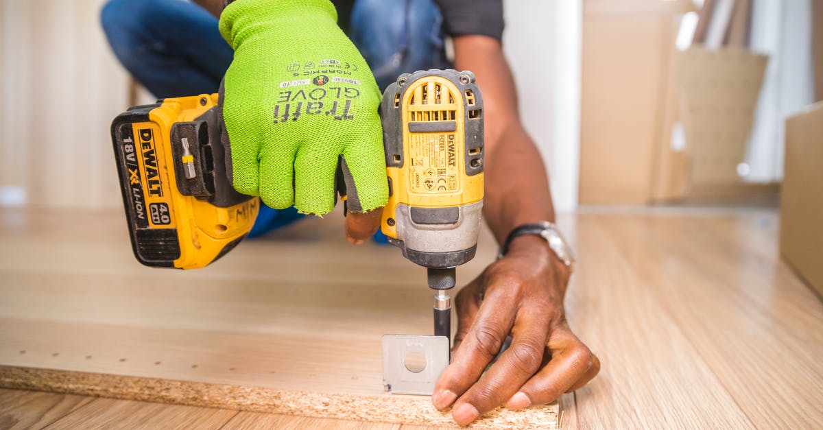 DIY Masa Harina - Person Using Dewalt Cordless Impact Driver on Brown Board DIY Masa Harina - Person Using Dewalt Cordless Impact Driver on Brown Board
