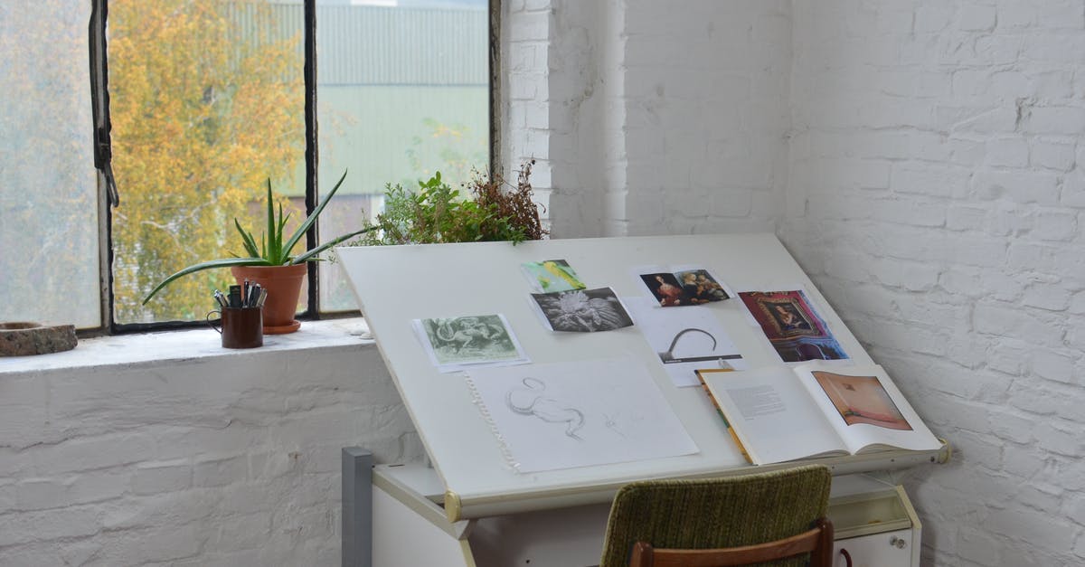 DIY Pot Noodle safe ingredients - Opened books with various pictures and sketch placed on drawing table near window in workshop DIY Pot Noodle safe ingredients - Opened books with various pictures and sketch placed on drawing table near window in workshop