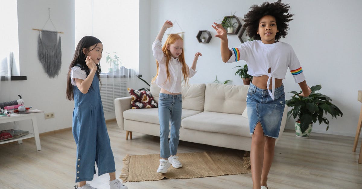 Do all yogurts have live active cultures? - Content multiracial children dancing with raised arms on floor near sofa in living room Do all yogurts have live active cultures? - Content multiracial children dancing with raised arms on floor near sofa in living room