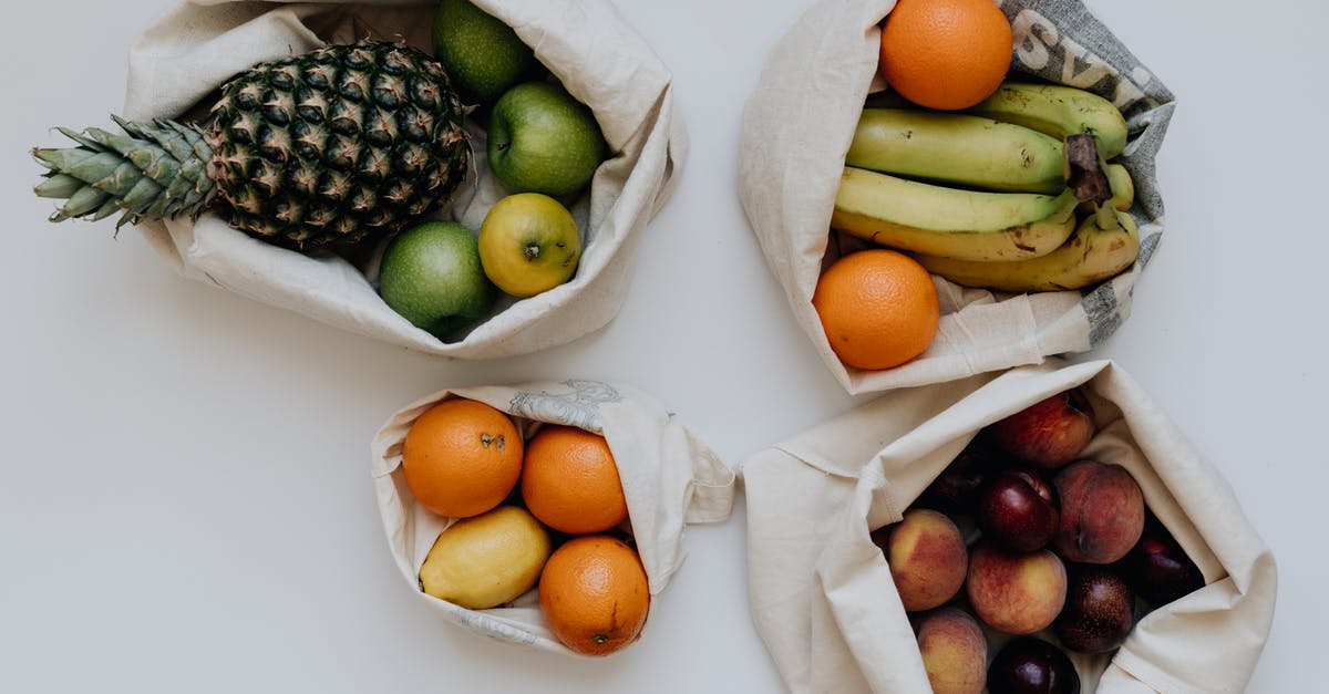 Do bananas ripen better in rice sacks? - Various Fruit in Sacks Against White Background