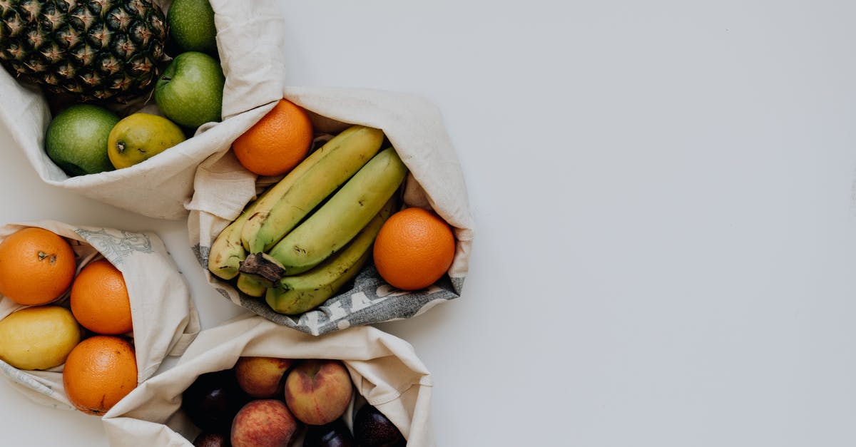 Do bananas ripen better in rice sacks? - Various Fruit in Sacks Against White Background