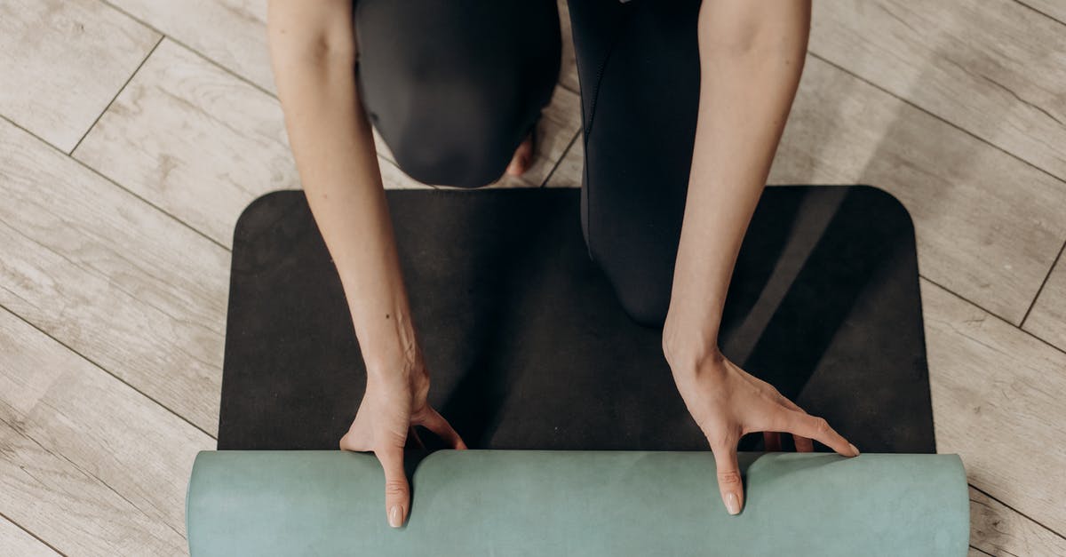 Do Dumplings Mind Being in the Fridge? - Woman in Black Leggings Unrolling A Yoga Mat Do Dumplings Mind Being in the Fridge? - Woman in Black Leggings Unrolling A Yoga Mat