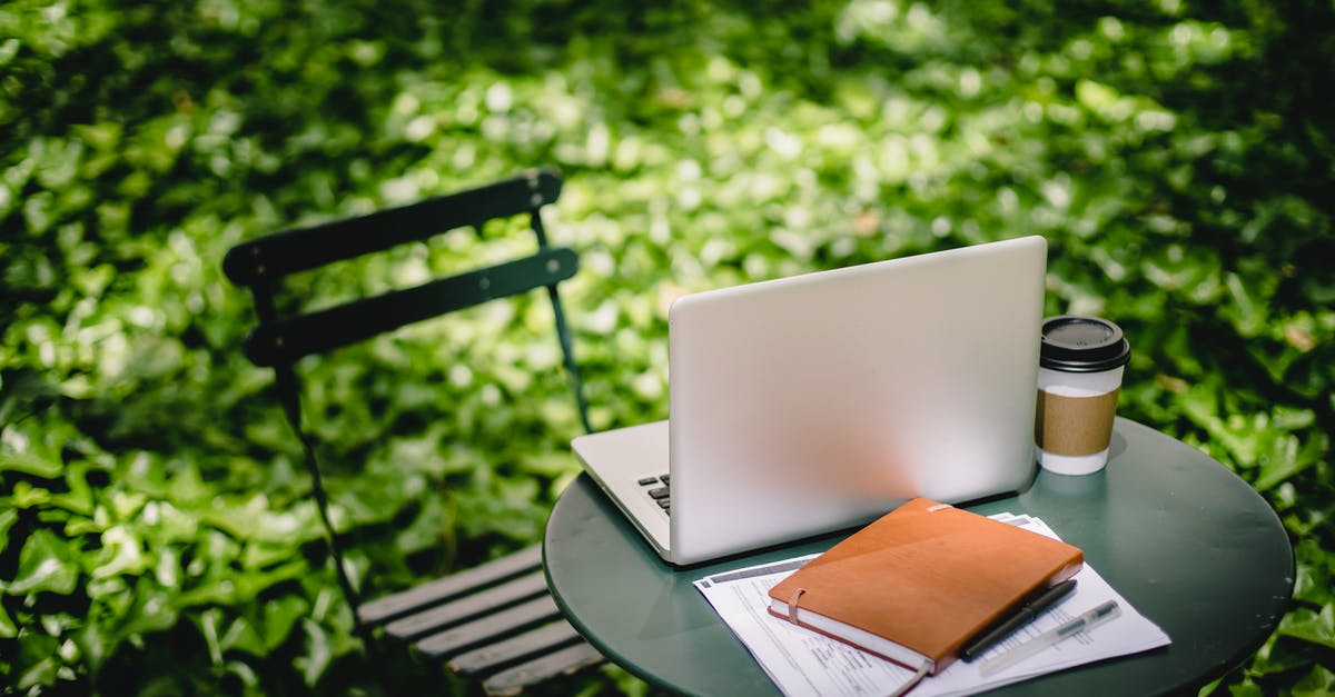 Do green lentils go bad? - Modern netbook with notebook placed on small round table near paper cup with hot drink in sunny green park Do green lentils go bad? - Modern netbook with notebook placed on small round table near paper cup with hot drink in sunny green park