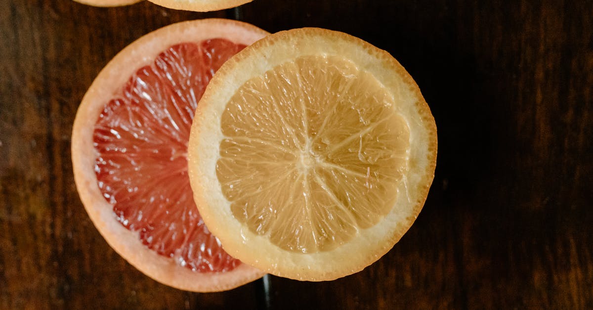 Do I always need to peel the avocado or I can just chop it? - Top view of texture of pulp of sliced grapefruit and lemon on wooden table Do I always need to peel the avocado or I can just chop it? - Top view of texture of pulp of sliced grapefruit and lemon on wooden table