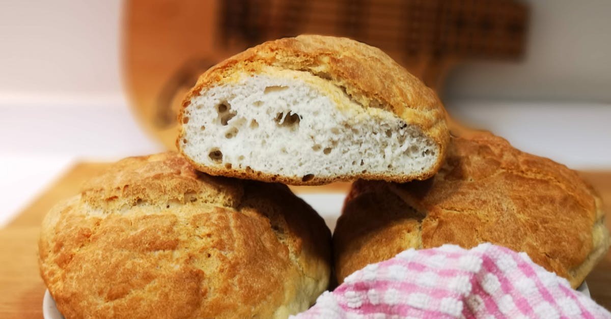 Do I need a specific pan for baking sourdough bread? - Photo Of Breads On Plate Do I need a specific pan for baking sourdough bread? - Photo Of Breads On Plate