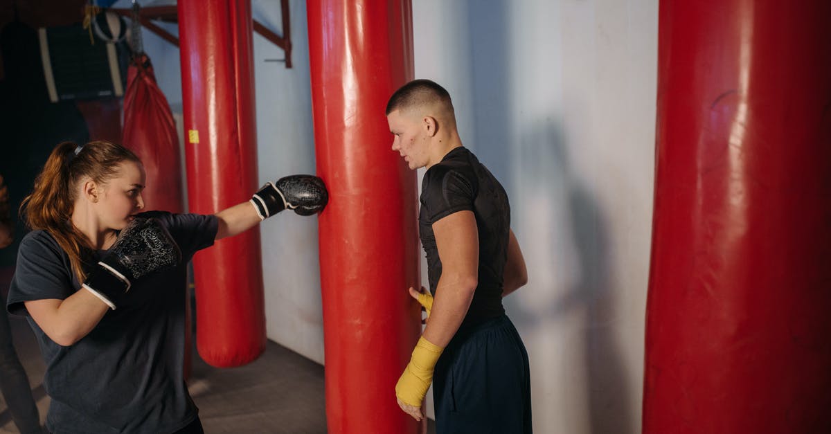 Do I need special gloves for mozzarella stretching? - Woman Hitting the Red Punching Bag Do I need special gloves for mozzarella stretching? - Woman Hitting the Red Punching Bag