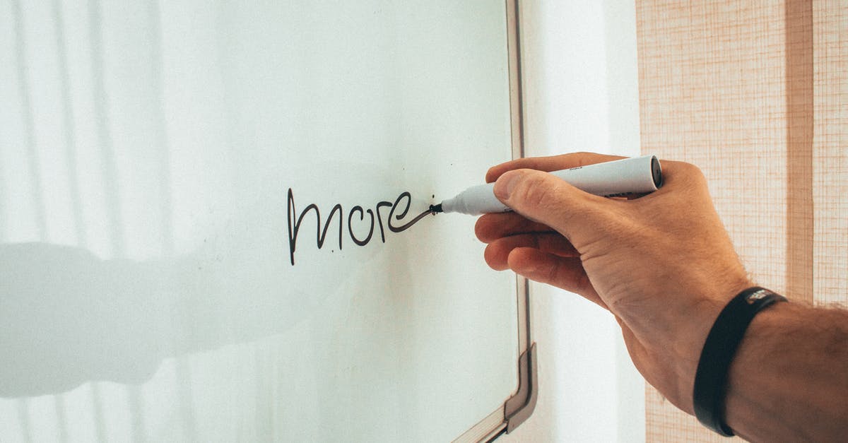 Do more peppers mean more heat? - Crop unrecognizable man writing more word with marker on whiteboard during creating new startup in light workplace Do more peppers mean more heat? - Crop unrecognizable man writing more word with marker on whiteboard during creating new startup in light workplace