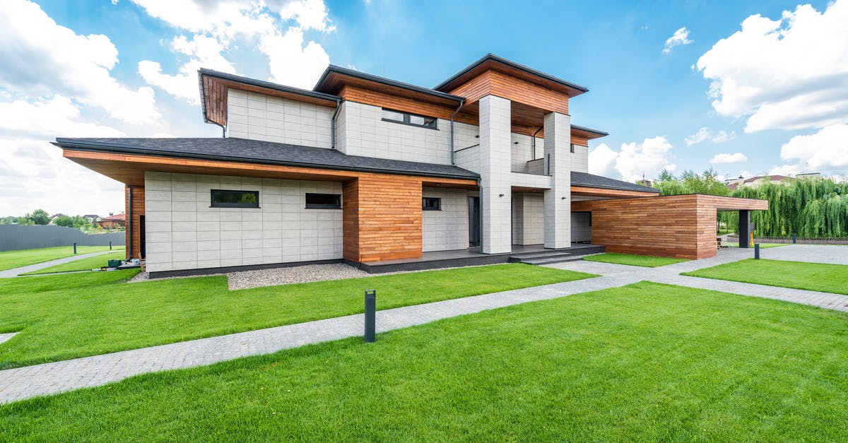 Do nettles grow in Florida? - Exterior of residential house with green trees and lawn growing in countryside in summertime Do nettles grow in Florida? - Exterior of residential house with green trees and lawn growing in countryside in summertime