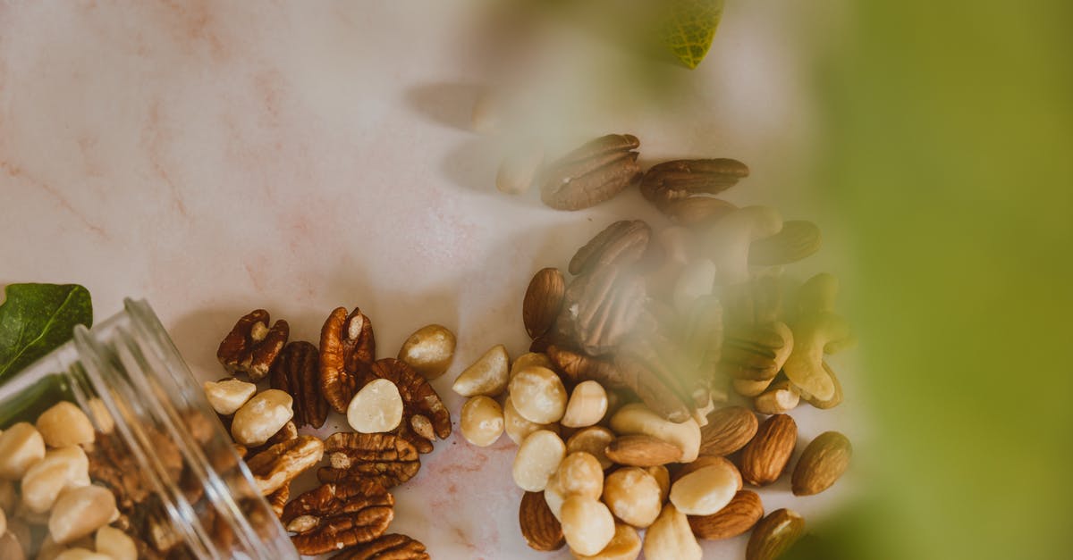 Do nuts ever go bad? - Nuts and Jar on Table Do nuts ever go bad? - Nuts and Jar on Table