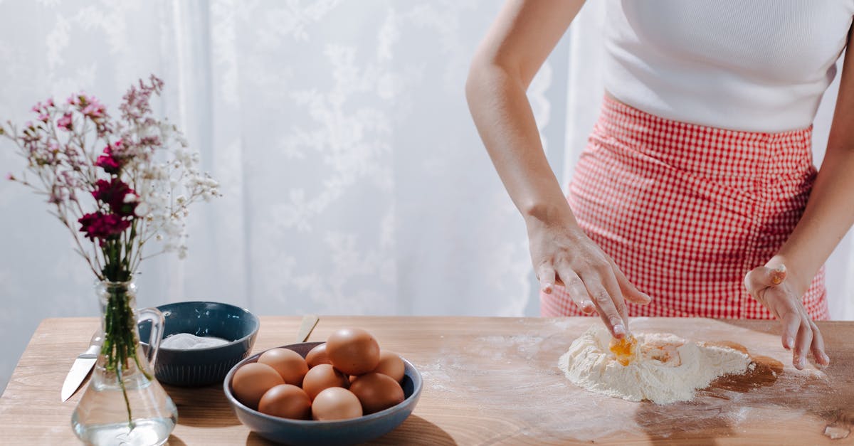Do you need eggs for extruded pasta dough? - Unrecognizable Woman Mixing Ingredients for Italian Pasta on Tabletop Do you need eggs for extruded pasta dough? - Unrecognizable Woman Mixing Ingredients for Italian Pasta on Tabletop