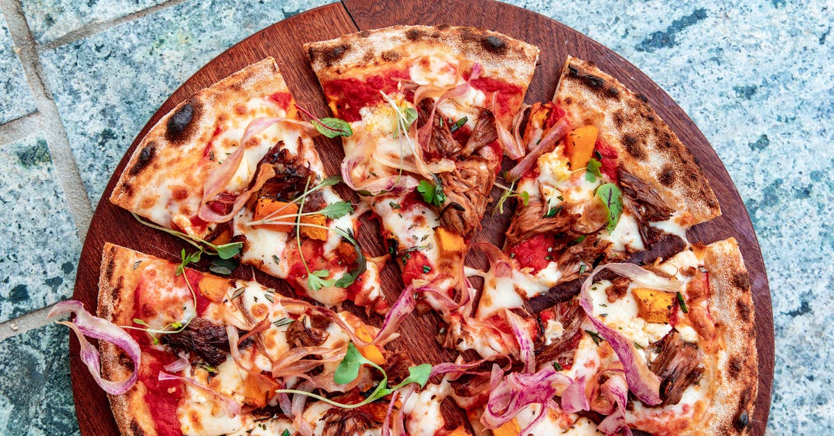 Do you need to rinse vegetables that can be peeled? - Top View of a Sliced Pizza Do you need to rinse vegetables that can be peeled? - Top View of a Sliced Pizza