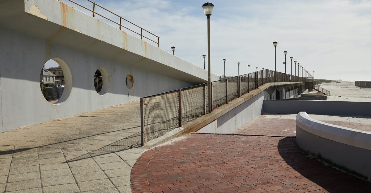 Do you season a cast iron waffle pan before using? - Pier with concrete tile and streetlights