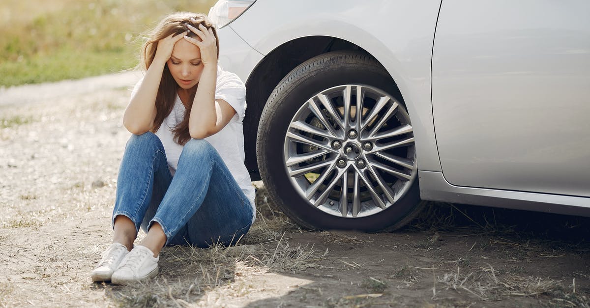 Does a head of lettuce really need to be refrigerated? - Frustrated female driver in white t shirt and jeans sitting on ground near damaged car with hands on head during car travel in sunny summer day Does a head of lettuce really need to be refrigerated? - Frustrated female driver in white t shirt and jeans sitting on ground near damaged car with hands on head during car travel in sunny summer day