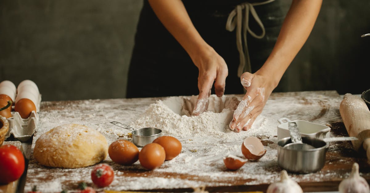 Does a pressure cooker really cook food evenly? - Woman making dough on table Does a pressure cooker really cook food evenly? - Woman making dough on table