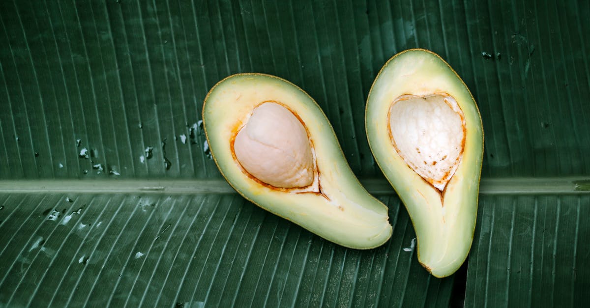 Does an avocado seed help guacamole stay green? - Sliced Avocado Fruit on A Banana Leaf Does an avocado seed help guacamole stay green? - Sliced Avocado Fruit on A Banana Leaf