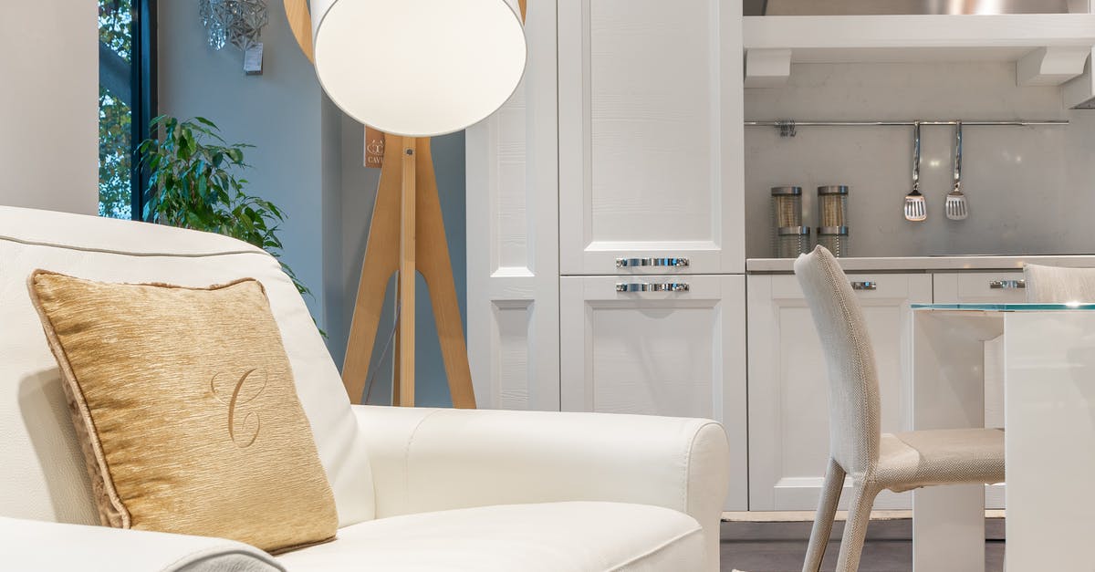 Does an electric crepe maker require a hood and ventilation? - Interior of modern apartment with armchair and lamp placed near kitchen area Does an electric crepe maker require a hood and ventilation? - Interior of modern apartment with armchair and lamp placed near kitchen area