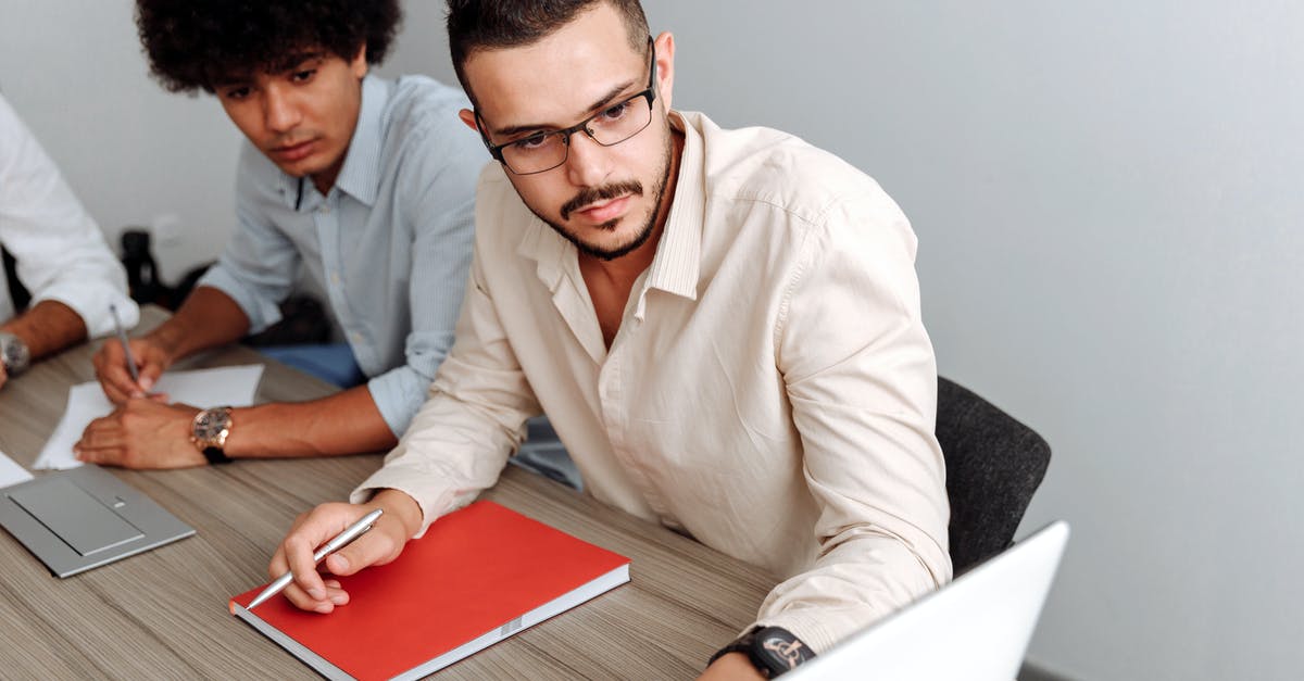 Does anybody know what company made this spatula? - Man Wearing Beige Dress Shirt Looking at a Laptop Does anybody know what company made this spatula? - Man Wearing Beige Dress Shirt Looking at a Laptop