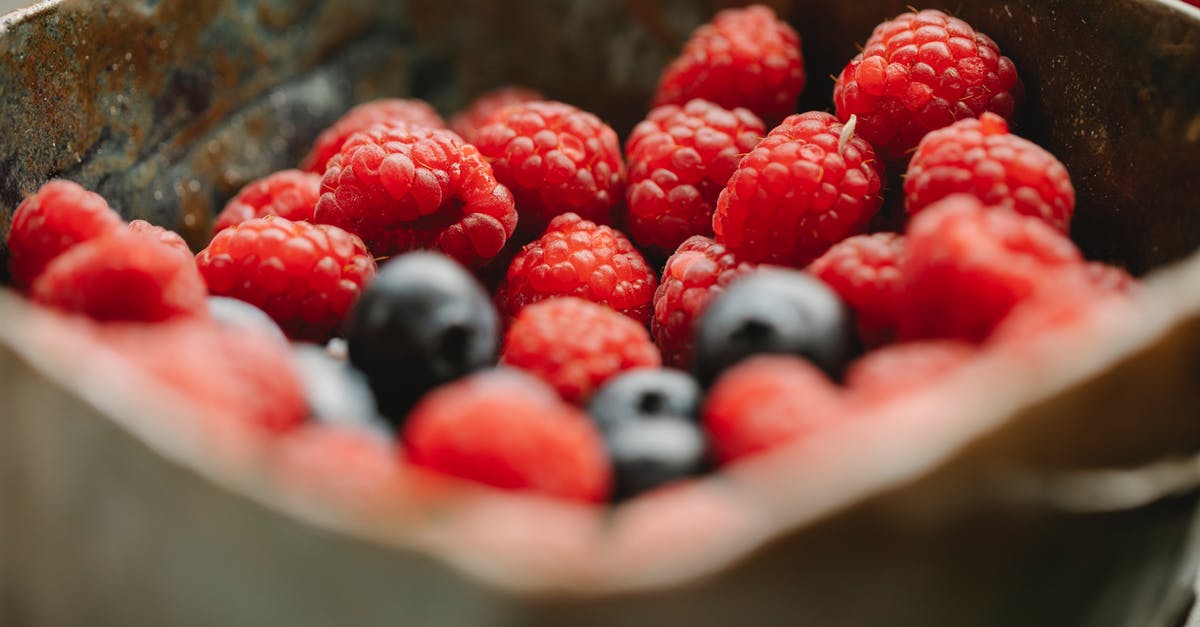 Does blanching cause loss of mass/weight in the vegetable? - Appetizing ripe raspberries and blueberries in bowl Does blanching cause loss of mass/weight in the vegetable? - Appetizing ripe raspberries and blueberries in bowl