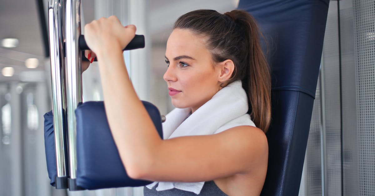 Does blanching cause loss of mass/weight in the vegetable? - Young determined sportswoman doing exercise on weight machine in modern sports club Does blanching cause loss of mass/weight in the vegetable? - Young determined sportswoman doing exercise on weight machine in modern sports club